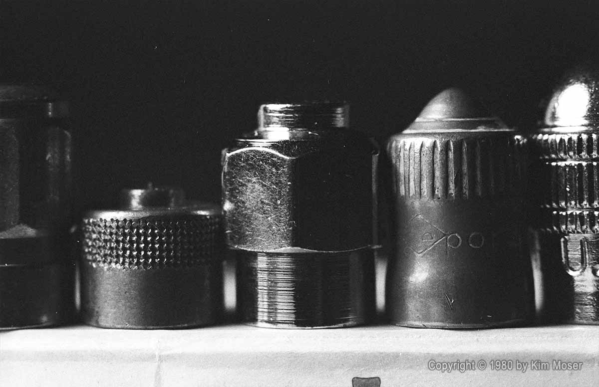 Valve Caps - Copyright © 1980 by Kim Moser